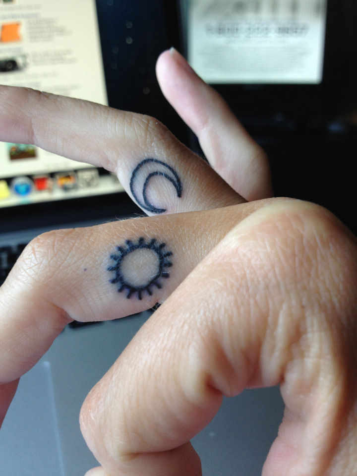 Small Sun And Moon Tattoos On The Fingers
