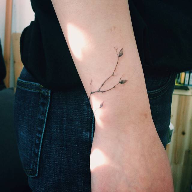 Tiny Branch Tattoo On Wrist