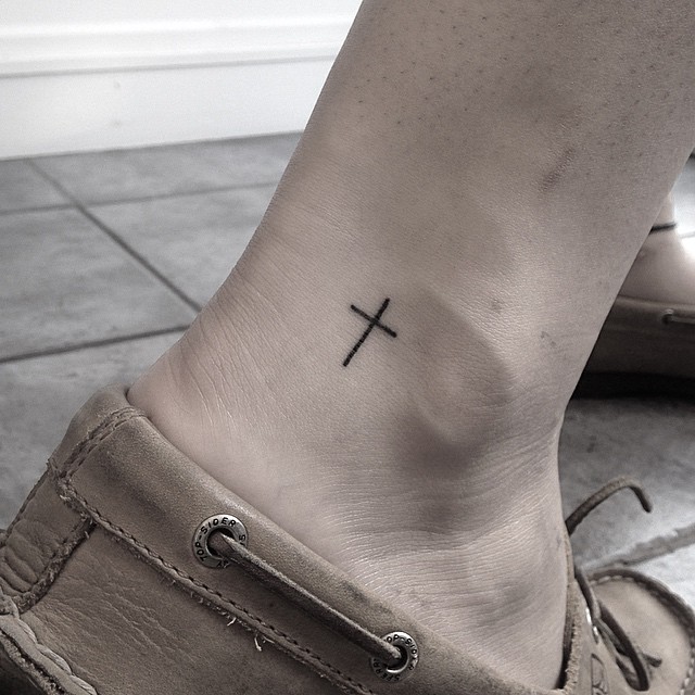 Tiny Cross Tattoo On The Ankle