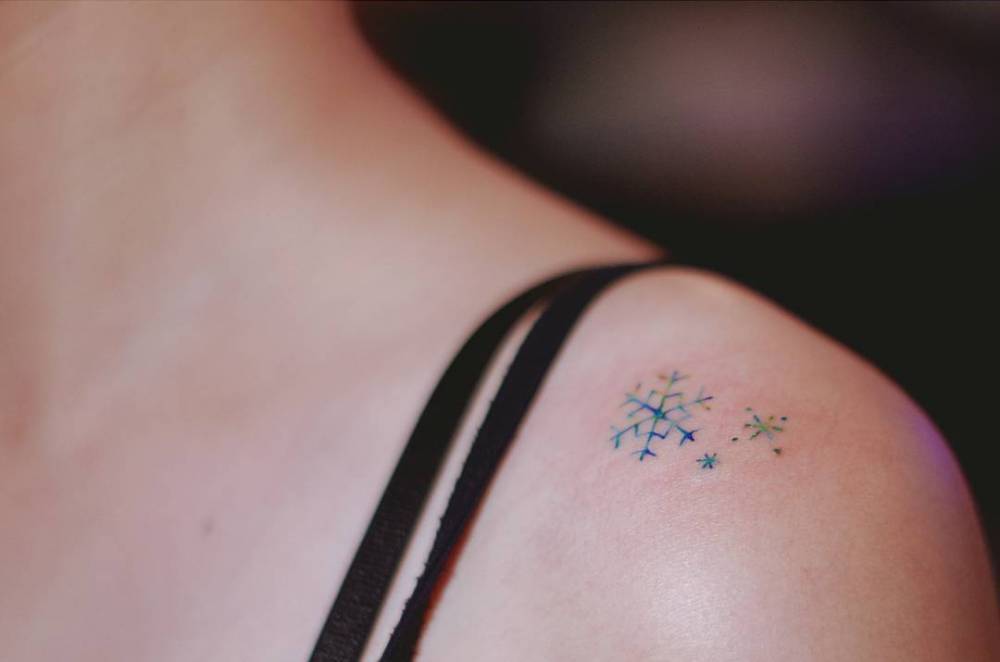 Tiny Snowflakes On The Shoulder