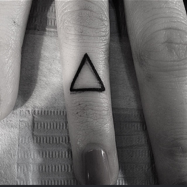Tiny Triangle Tattoo On The Finger