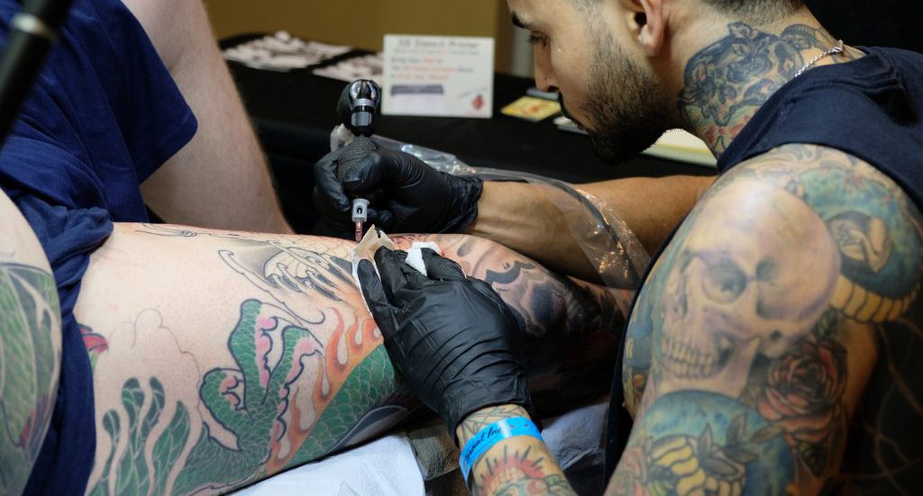 Applying a lot of ointment can heal a tattoo faster.
