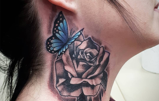 Big and Bold Butterfly Tattoo on Neck