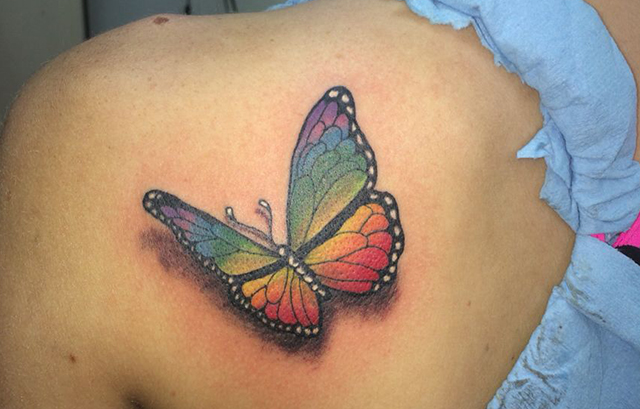 Butterfly rainbow tattoo