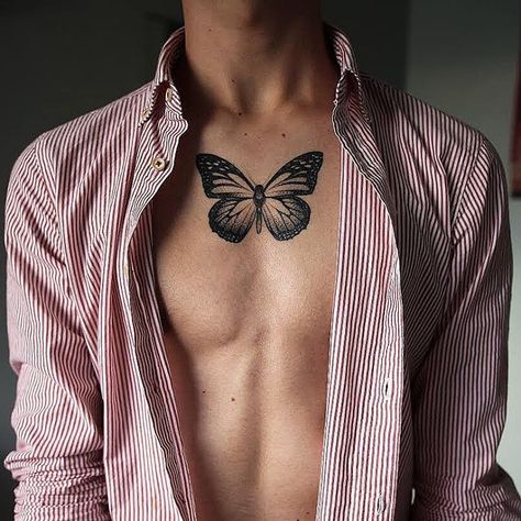 Butterfly tattoo on man's chest