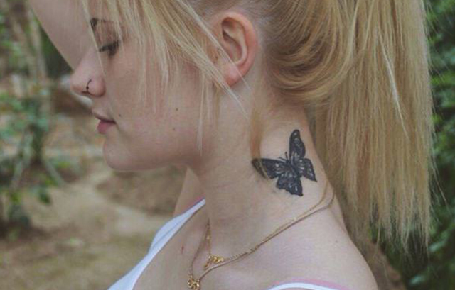 Blackish Butterfly tattoo on side neck