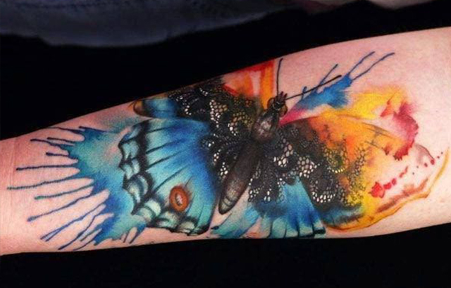 Colorful butterflies Tattoo on arm