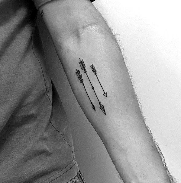 three Arrows Tattoo designs on arm