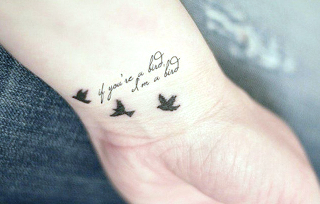 Tiny Font with Little Birds Tattoo on Her Wrist