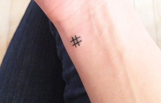 Tiny Hash or Proud Sign Tattoo on Wrist