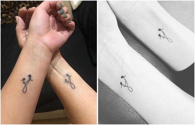 Tiny Mother Daughter Symbol Tattoo on her Arm or Wrist