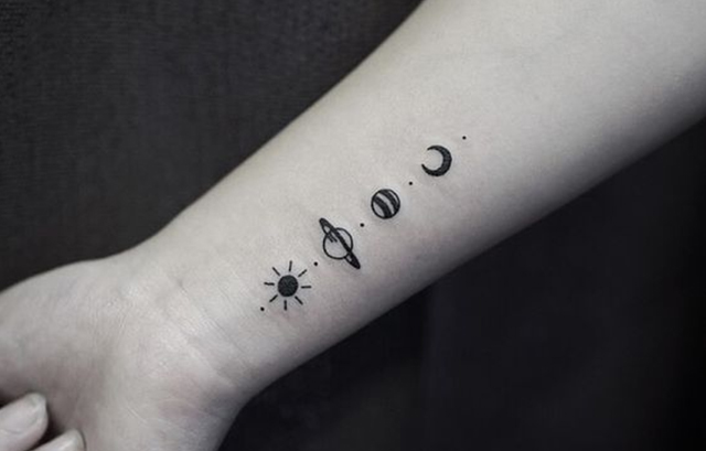 Tiny Solar System Tattoo on Wrist