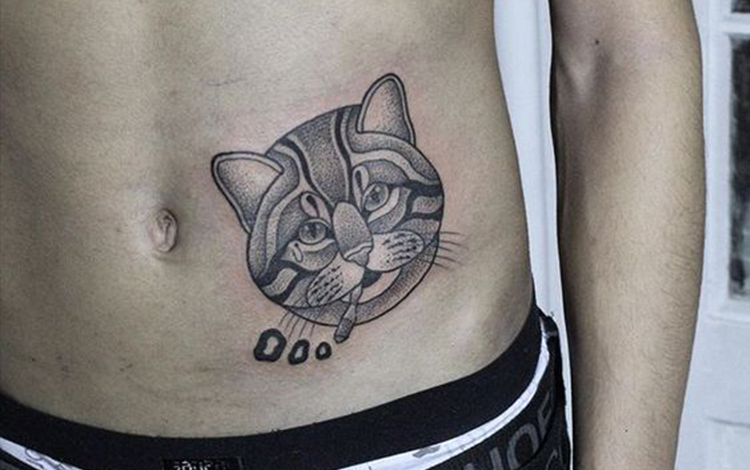 Cat face tattoo