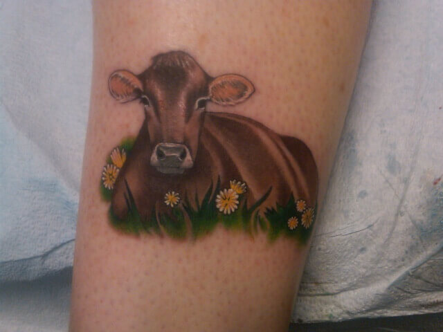 Cool-Cow-With-Flowers-Tattoo-Design-For-Arm
