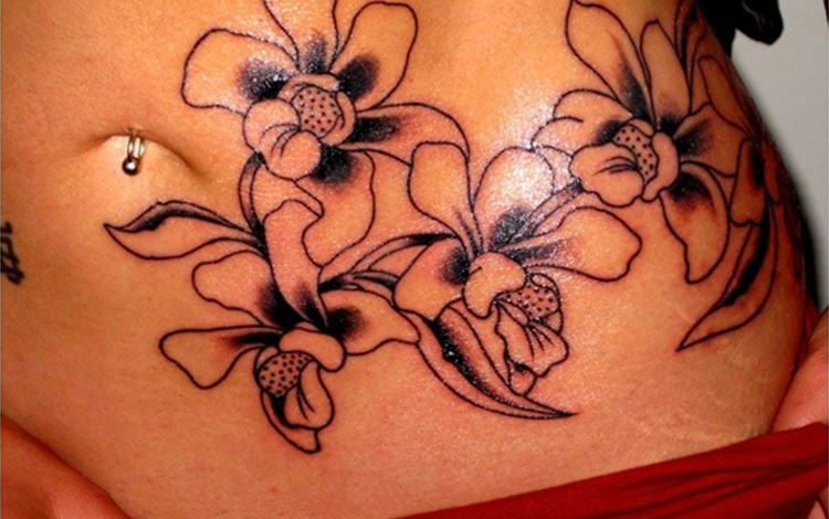 Orchids tattoo on trunk
