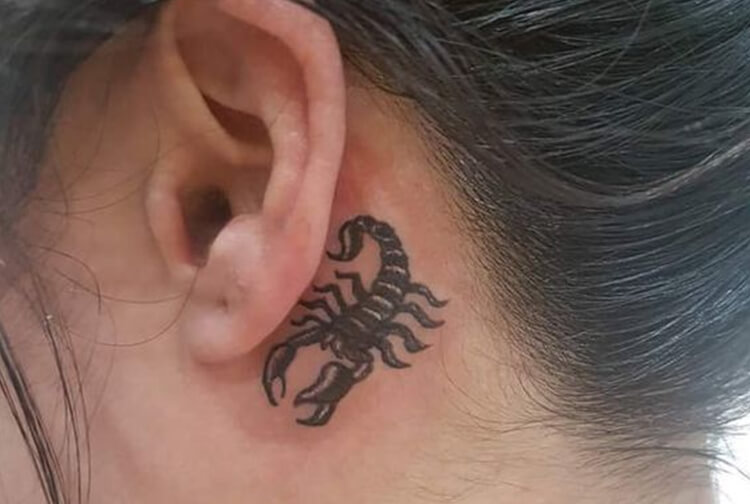 Tiny Scorpion Tattoo on neck