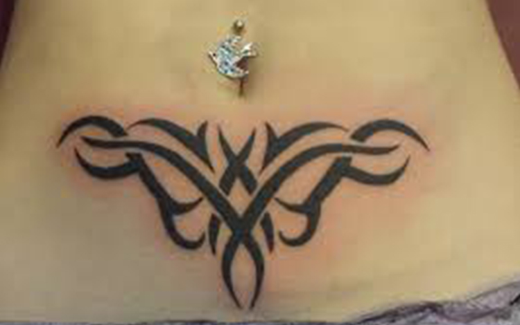 Tribal tattoo on tummy