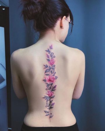 flower spine tattoo