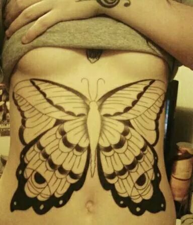 Giant Butterfly tattoo on tummy