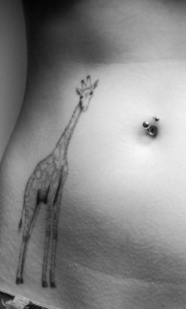 Giraffe tattoo on tummy
