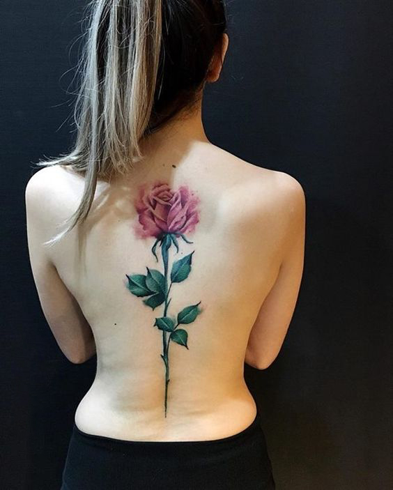 Rose tattoo on Girl's spine
