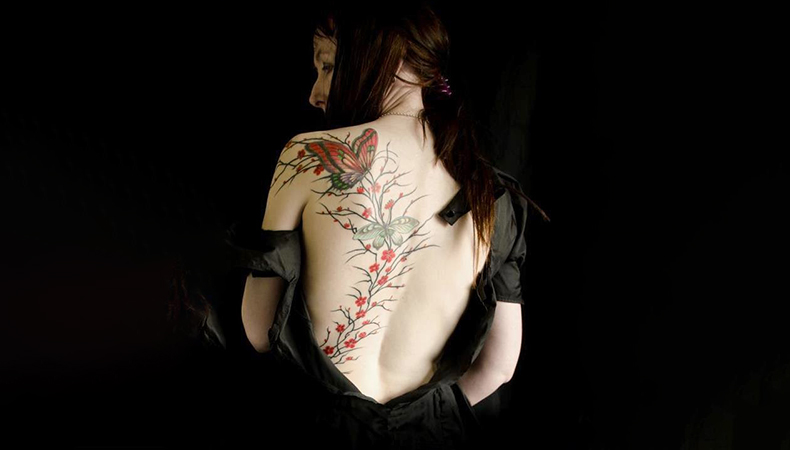 Hot Butterfly leaf tattoo on back