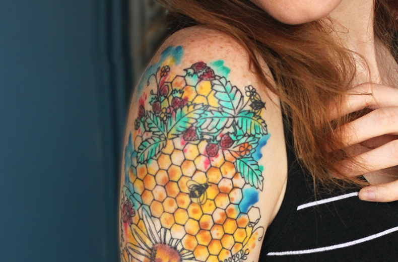 Flowers leaves and bumblebees on shoulder