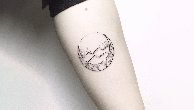 Moon tattoo on hand