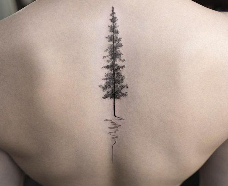 tree tattoo on spine