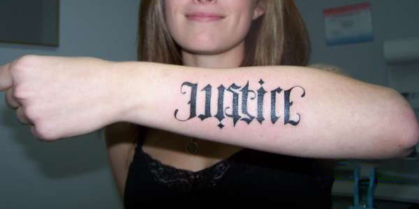 Justice ambigram tattoo