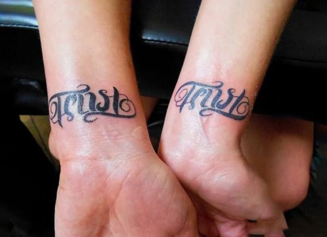 Ambigram tattoo on wrist