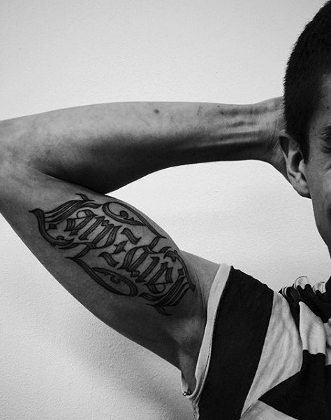 Bicep mens name ambigram tattoos