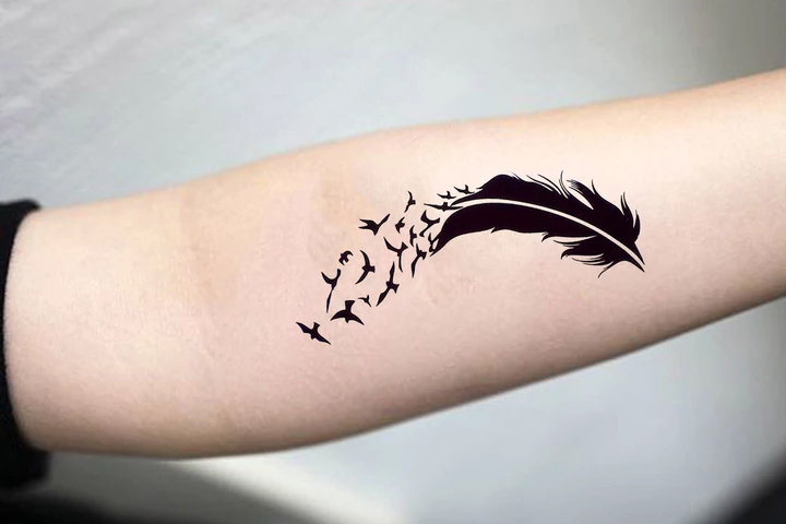 Crow feather tattoo