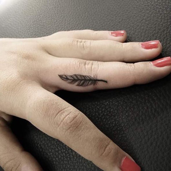 Cute feather Tattoo on your finger