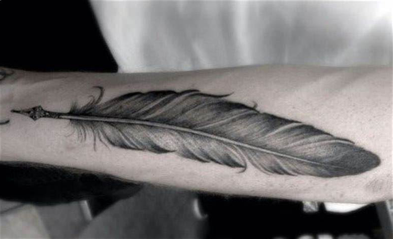 Eagle feather tattoo on your forearm tattoo
