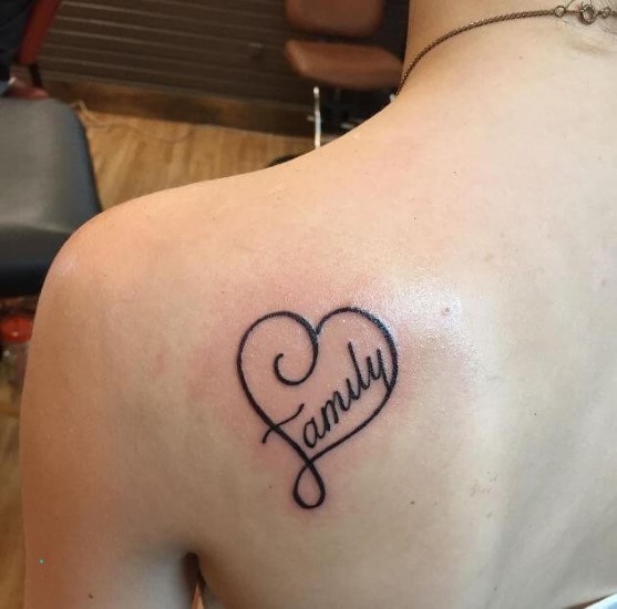 FAMILY written in heart tattoo
