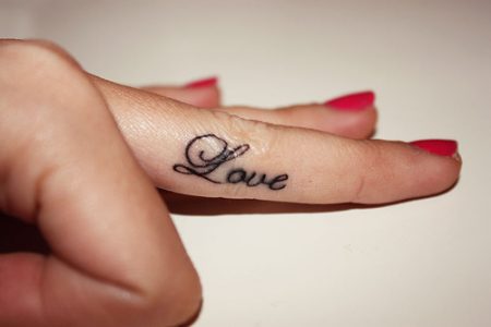 Small Love Tattoo on Finger