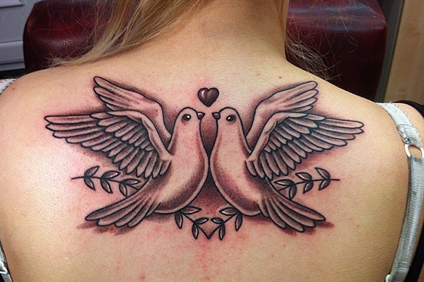 Heart with Dove back tattoo