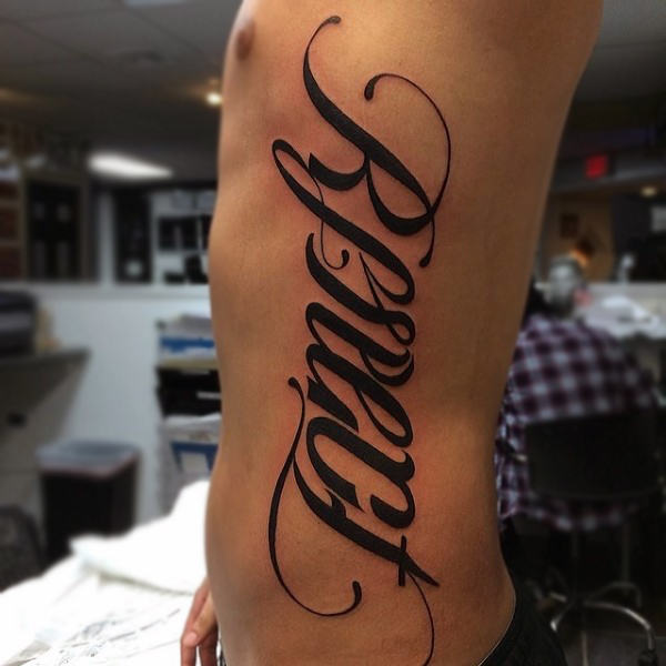 Mens ambigram tattoo of respect word lettering on ribs