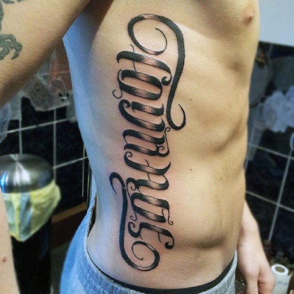 Mens rib cage side ambigram tattoos