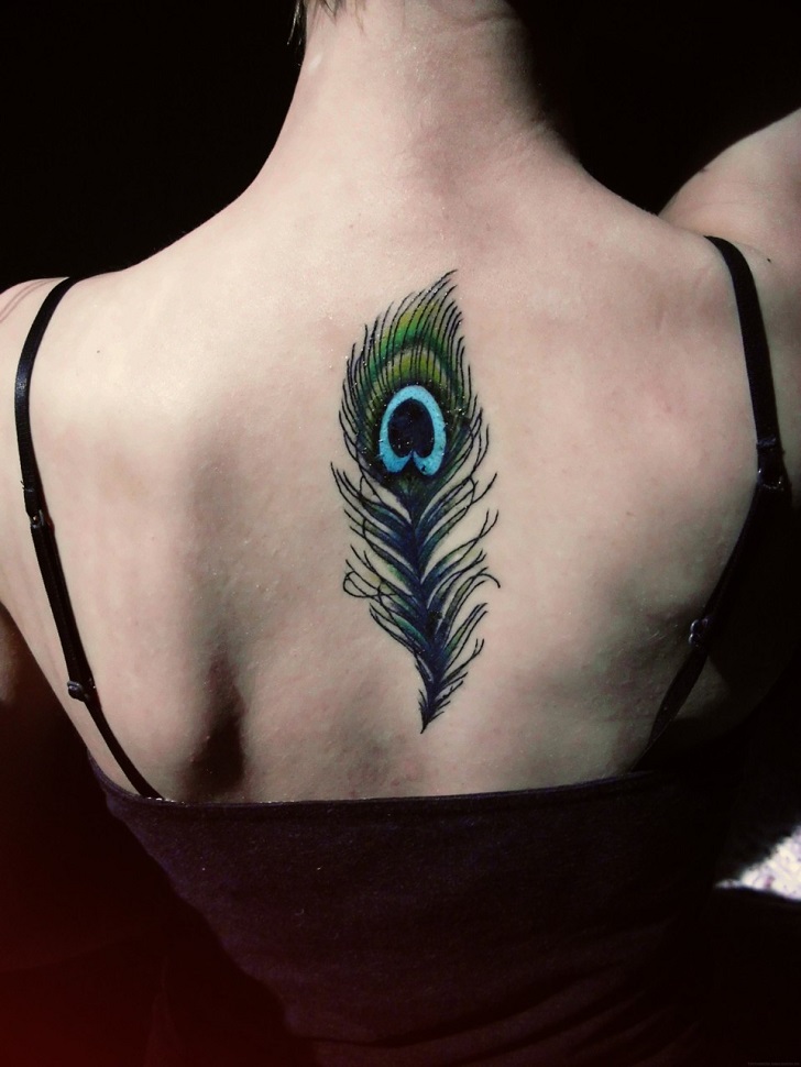 Peacock feather tattoo