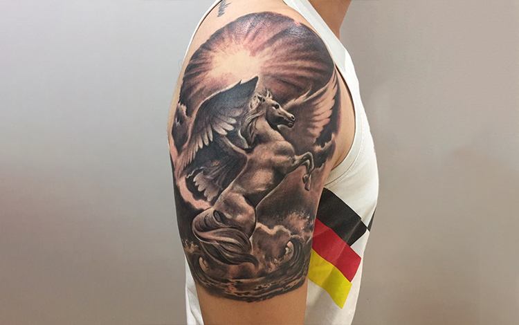 Pegasus the mythical horse tattoo on arm area