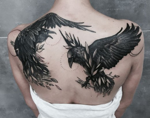 Raven feather tattoo on your back