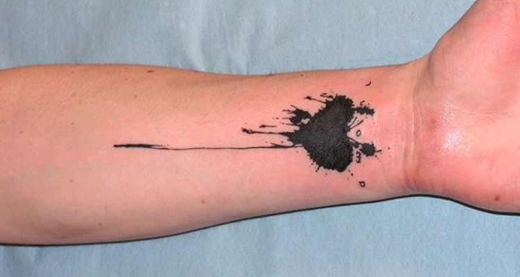 Splashes Heart Tattoo designs on forearm