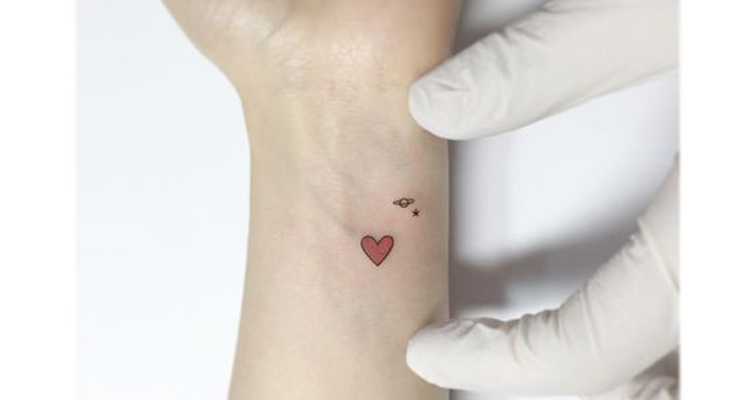 Tiny Red Heart Tattoo on Wrist