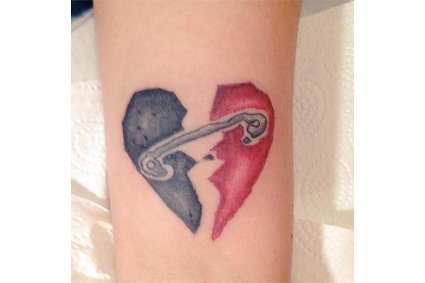 Two Broken Pieces of Heart tattoo