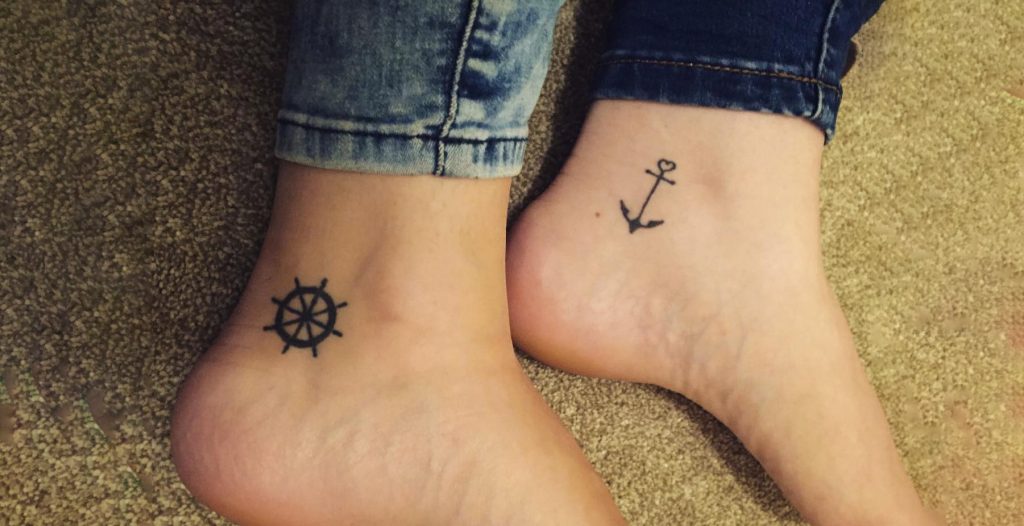 Wheel and Anchor Ankle tattoo