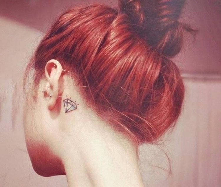 23. A miniature diamond symbol tattoo behind your ear.