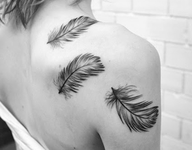 miniature feather tattoo on your shoulder back