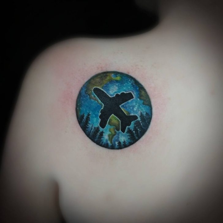 A Globe with Black Airplane tattoo 15